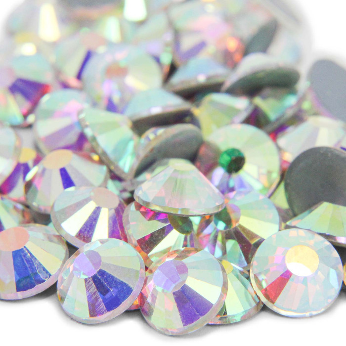 Machine cut crystal rhinestones in clear AB with iridescent facets and gray glue backing round shape and various sizes.