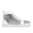 Red high-top sneakers made of leather and suede adorned with glass rhinestones featuring a smooth texture and rubber sole. Red high-top sneakers made of leather and suede adorned with glass rhinestones featuring a smooth texture and rubber sole.