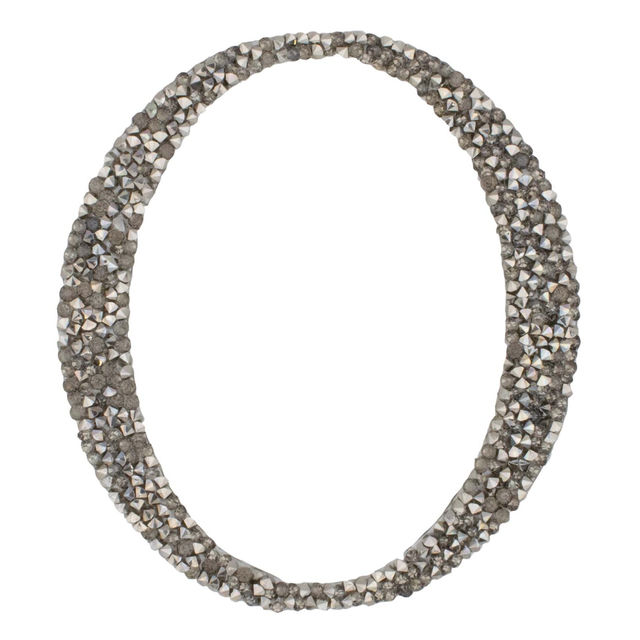 Silver script letter "L" with a textured surface embellished with small rhinestones featuring elegant curves and loops.