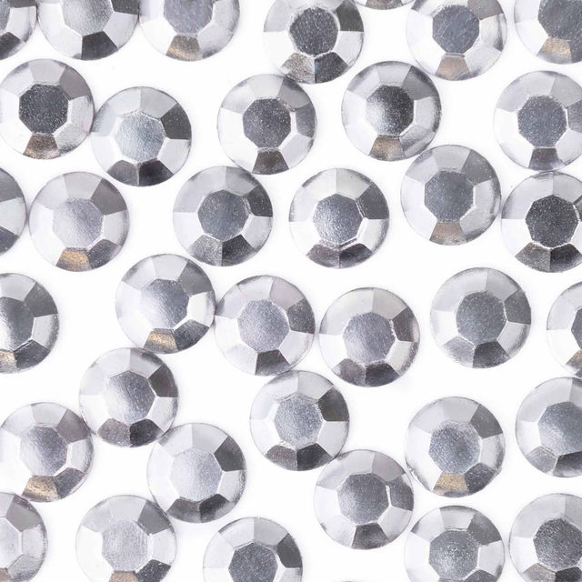 Gray machine-cut crystal rhinestones with faceted surfaces featuring a shiny metallic finish and a smooth backing.