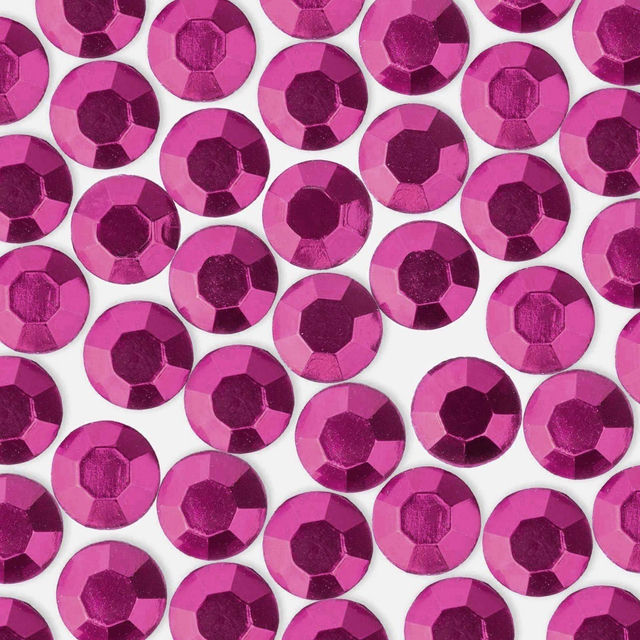 Faceted round rhinestones in vibrant fuchsia with a glossy finish featuring a flat back for application.