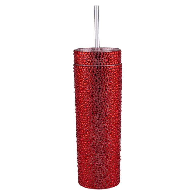 A tall silver tumbler covered in rhinestones with a clear straw and a smooth shiny surface.
