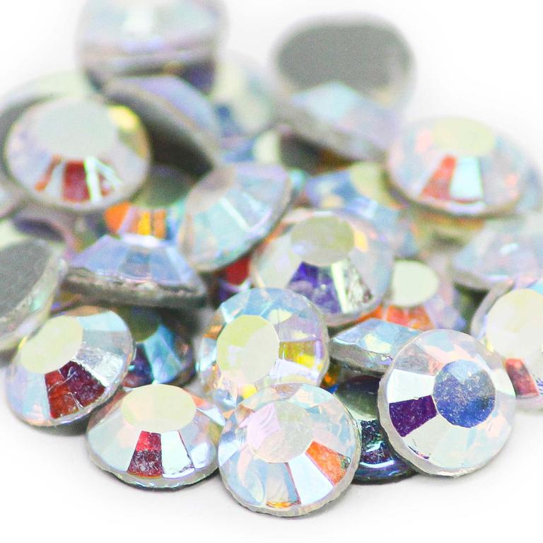 Machine&#x20;cut&#x20;crystal&#x20;rhinestones&#x20;in&#x20;clear&#x20;AB&#x20;with&#x20;a&#x20;silver&#x20;backing&#x20;featuring&#x20;multicolored&#x20;iridescent&#x20;facets&#x20;and&#x20;a&#x20;smooth&#x20;surface.