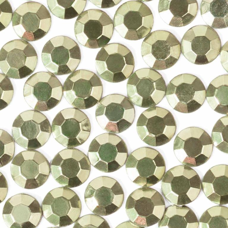 Lime green machine-cut crystal rhinestones with a faceted surface featuring a smooth shiny texture and gray glue backing.