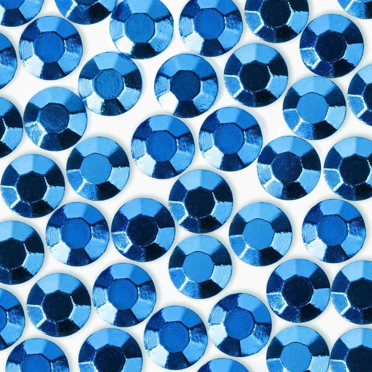 Medium blue crystal rhinestones with a faceted surface circular shape and glossy finish arranged closely together.