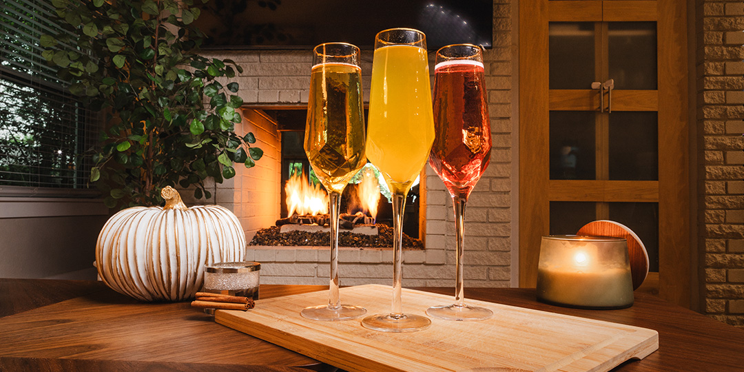 Apple&amp;&#x23;x20&#x3B;cider&amp;&#x23;x20&#x3B;mimosa&amp;&#x23;x20&#x3B;in&amp;&#x23;x20&#x3B;gold-rimmed&amp;&#x23;x20&#x3B;toasting&amp;&#x23;x20&#x3B;flute&amp;&#x23;x20&#x3B;with&amp;&#x23;x20&#x3B;cinnamon&amp;&#x23;x20&#x3B;stick&amp;&#x23;x20&#x3B;garnish&amp;&#x23;x20&#x3B;on&amp;&#x23;x20&#x3B;autumn&amp;&#x23;x20&#x3B;table