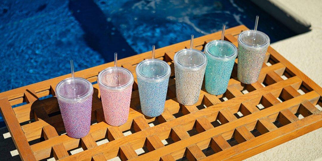 Collection&amp;&#x23;x20&#x3B;of&amp;&#x23;x20&#x3B;rhinestone&amp;&#x23;x20&#x3B;glam&amp;&#x23;x20&#x3B;tumblers&amp;&#x23;x20&#x3B;in&amp;&#x23;x20&#x3B;pastel&amp;&#x23;x20&#x3B;colors&amp;&#x23;x20&#x3B;on&amp;&#x23;x20&#x3B;wooden&amp;&#x23;x20&#x3B;pool&amp;&#x23;x20&#x3B;tray