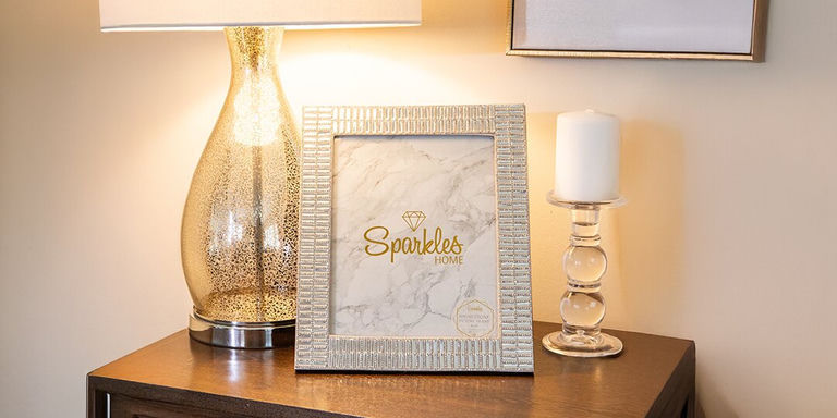 sparkly rhinestone Sparkles frame on nightstand