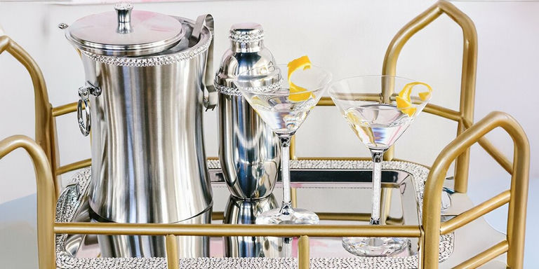rhinestone-accented martini glasses and shaker on mirrored tray with ice bucket