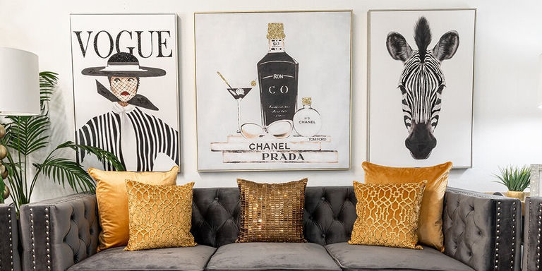 glamorous living room with mustard throw pillows and statement art prints